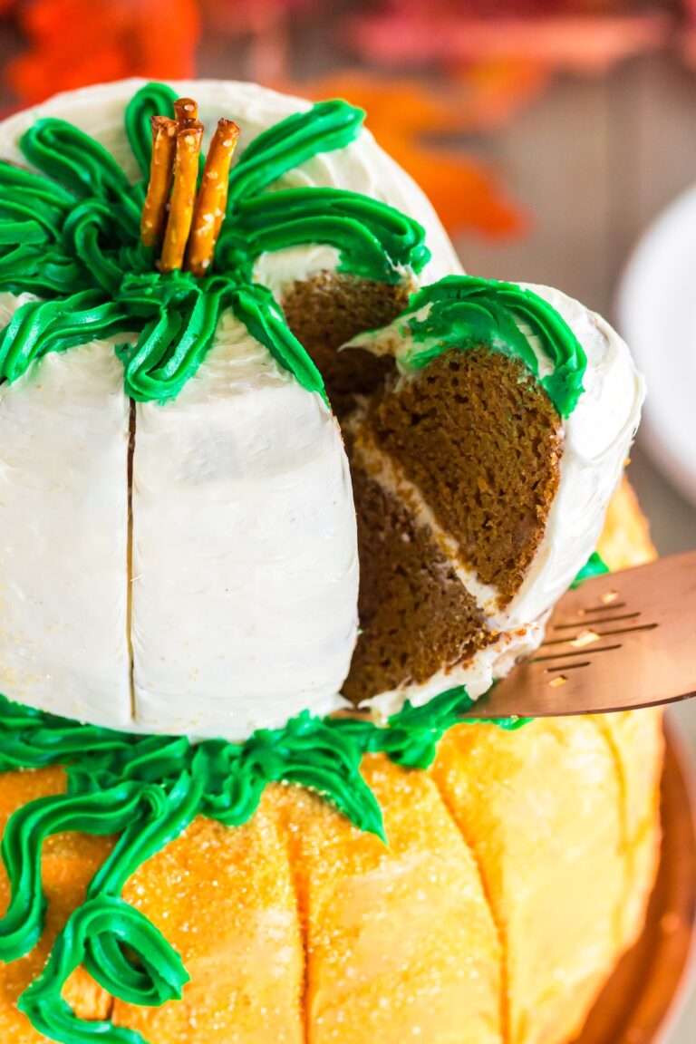 pumpkin bundt cake with a slice being removed